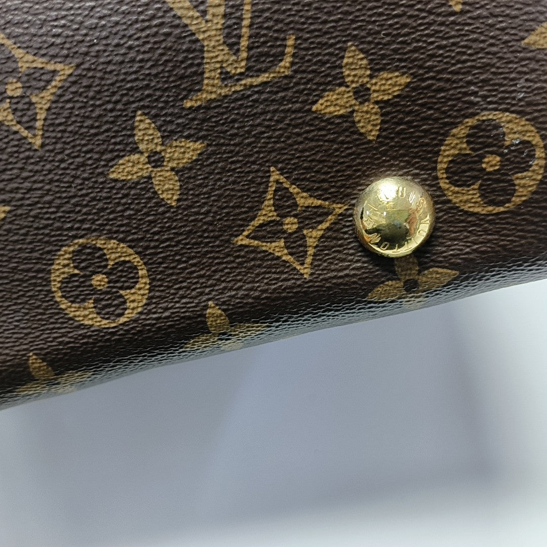 CARRYALL PM Monogram Coated Canvas Brown