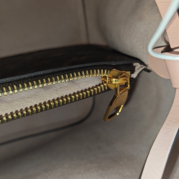 NÉONOÉ MM Monogram Coated Canvas Brown