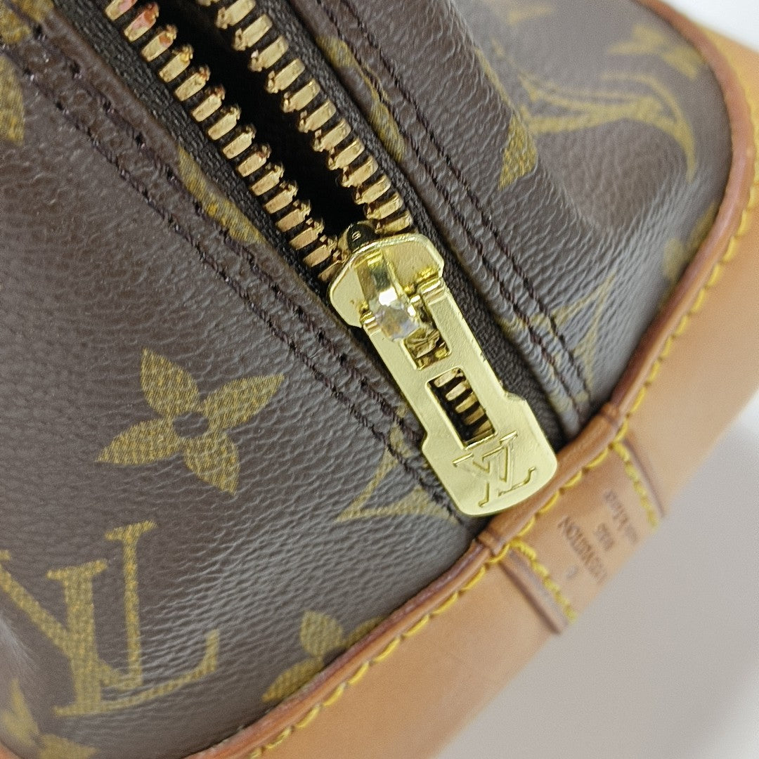 ALMA PM Monogram Coated Canvas Brown