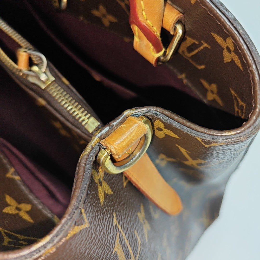 MONTAIGNE GM Monogram Coated Canvas Brown