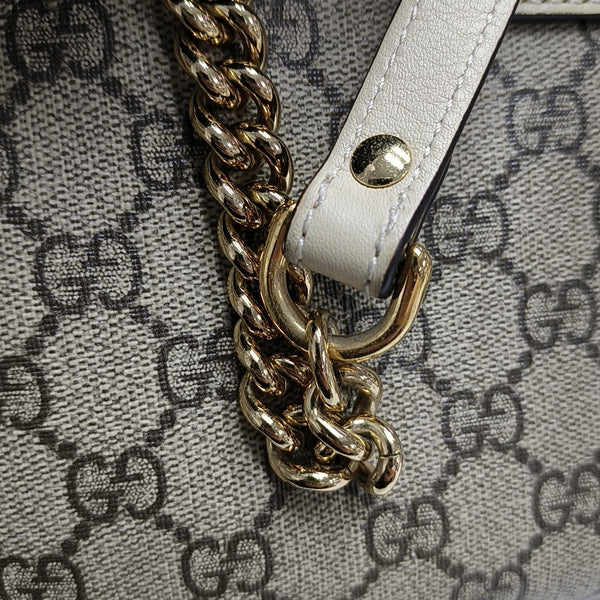 Padlock Small Monogram Coated Canvas Beige