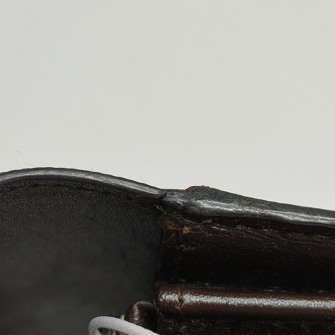 Monogram Leather Clutch Gray
