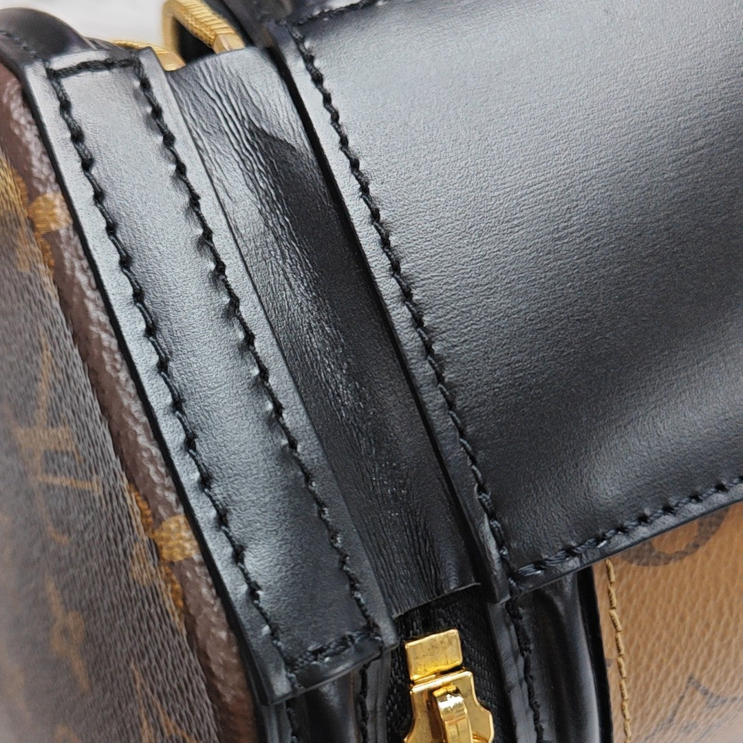 CANNES PM Monogram Coated Canvas Brown