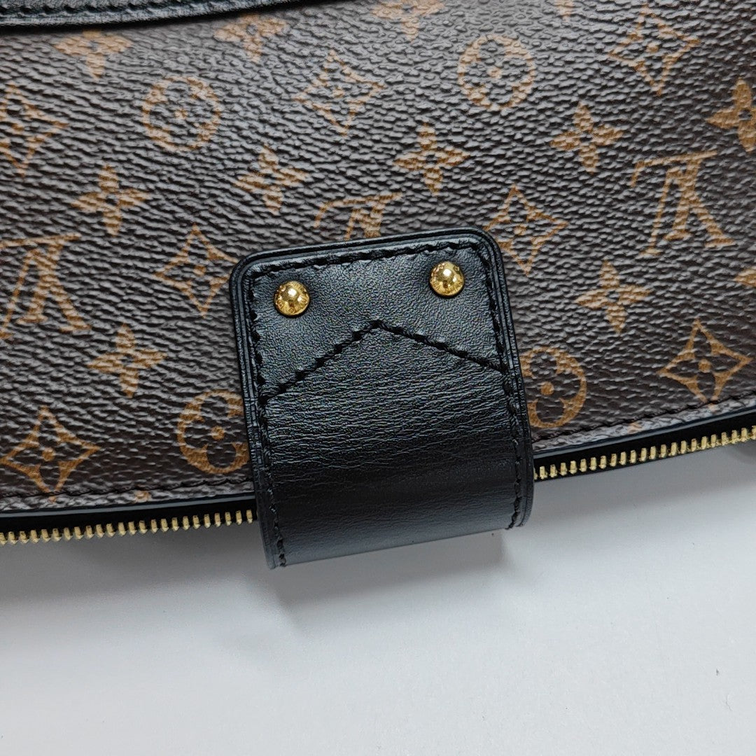 TRUNK Monogram Coated Canvas Brown