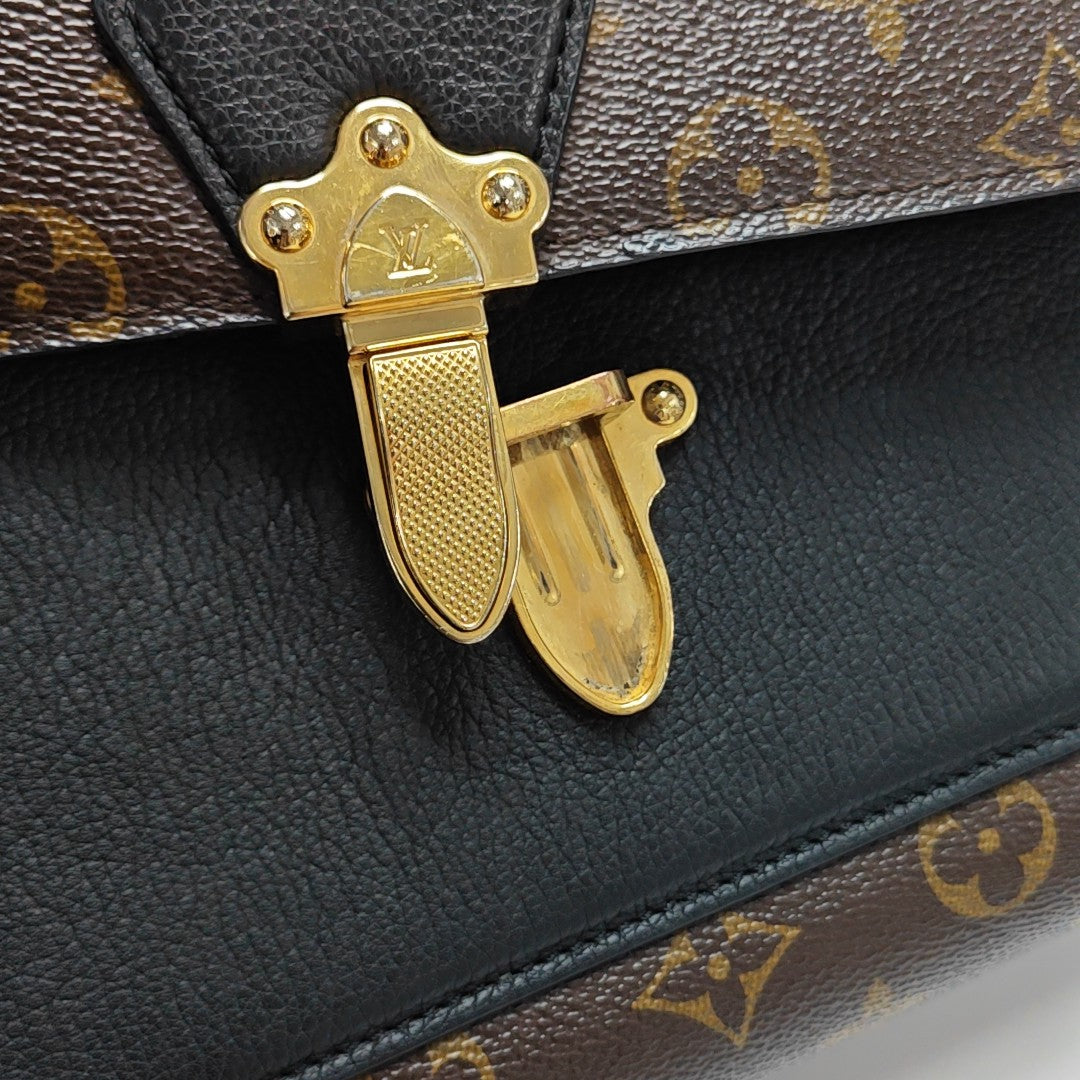 VICTOIRE Monogram Coated Canvas Brown