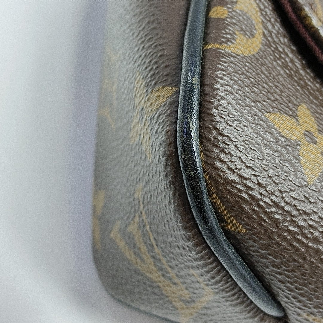 DISTRICT PM Monogram Coated Canvas Brown