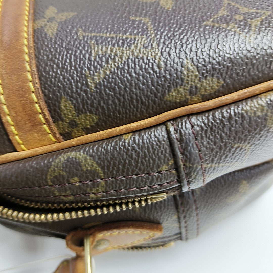 REPORTER PM Monogram Coated Canvas Brown