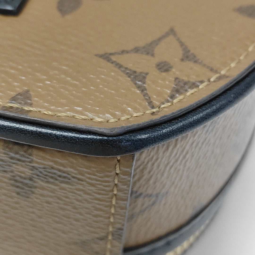 BOITE CHAPEAU Mini Monogram Coated Canvas Brown