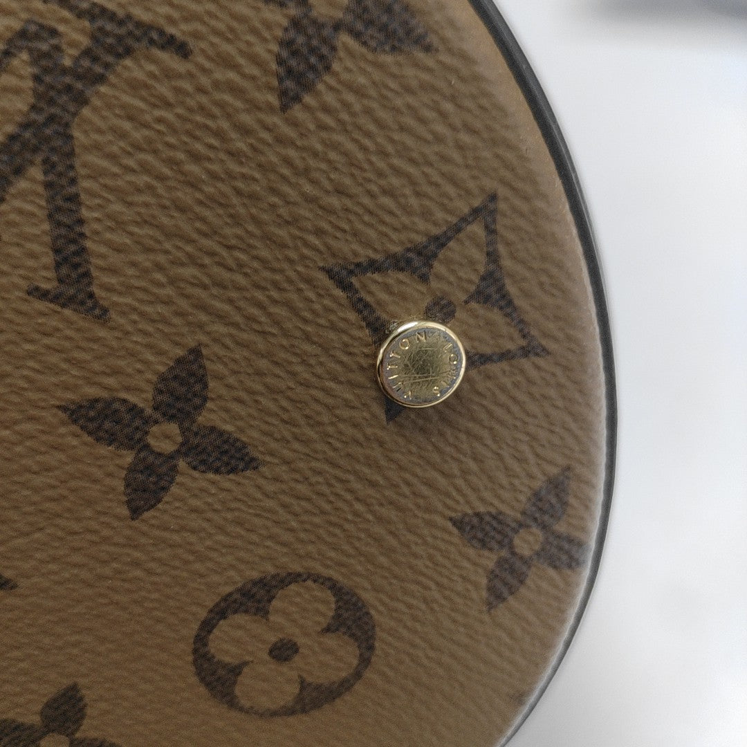 CANNES PM Monogram Coated Canvas Brown