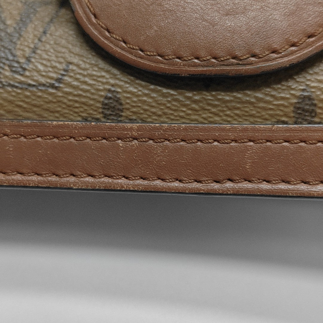 DAUPHINE MM Monogram Coated Canvas Brown