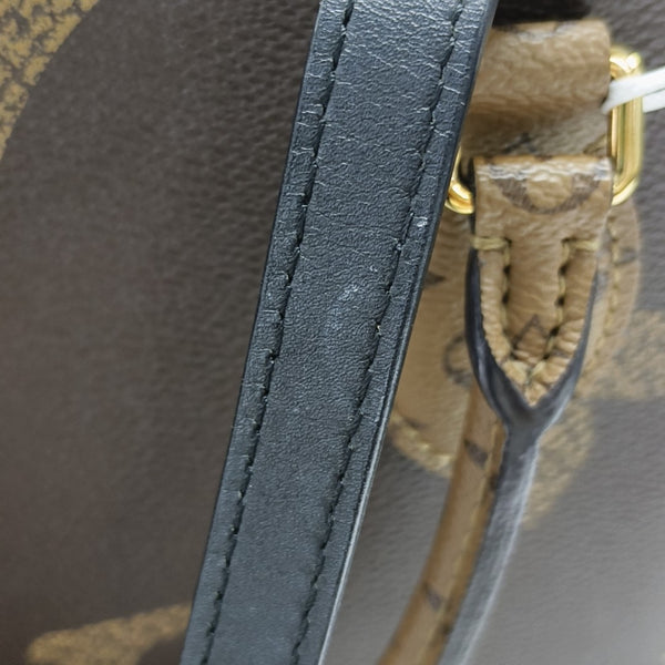 ONTHEGO MM Monogram Coated Canvas Brown