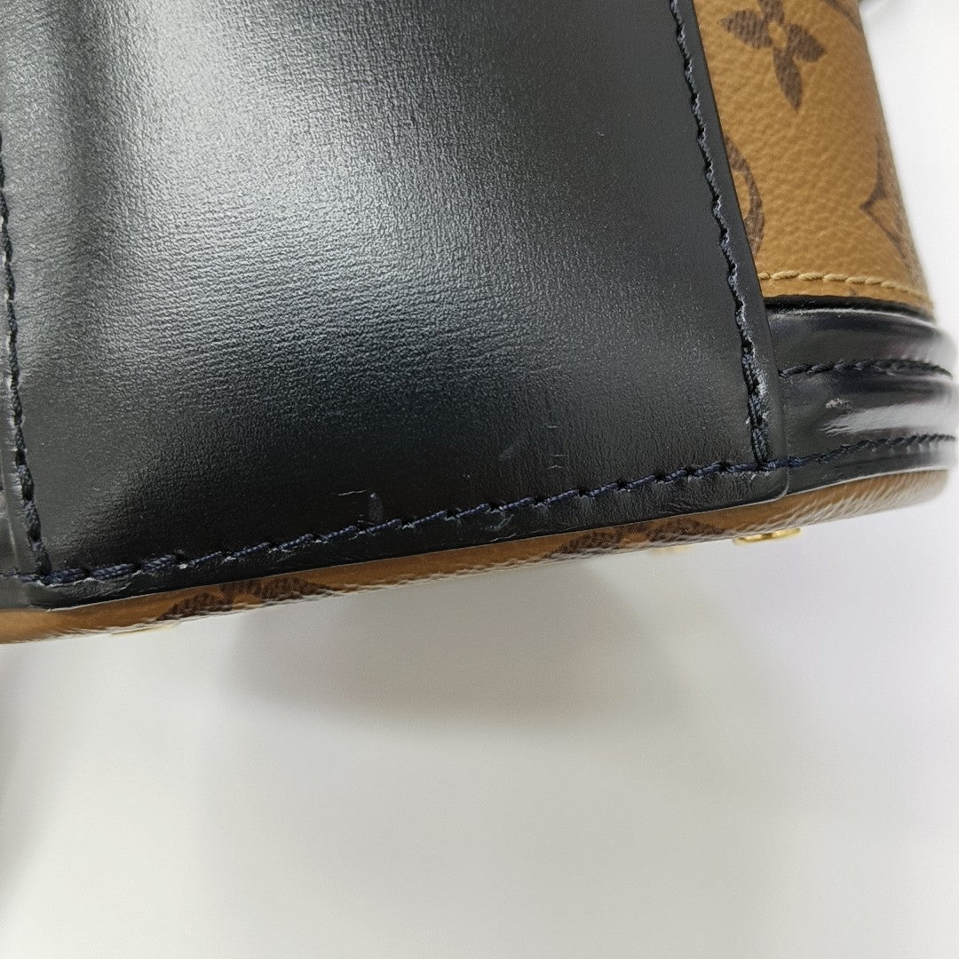 CANNES PM Monogram Coated Canvas Brown