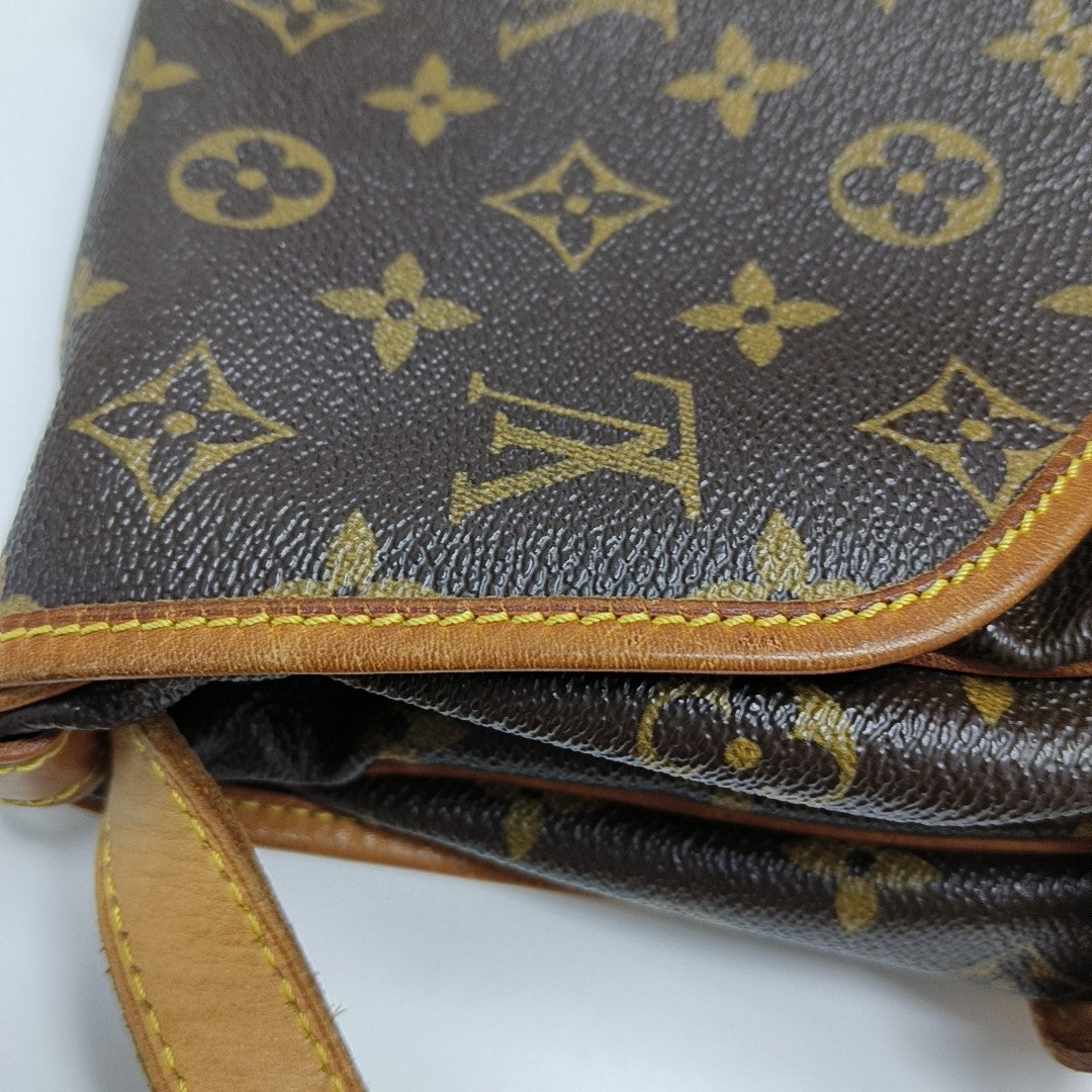 SAUMUR Monogram Coated Canvas Brown