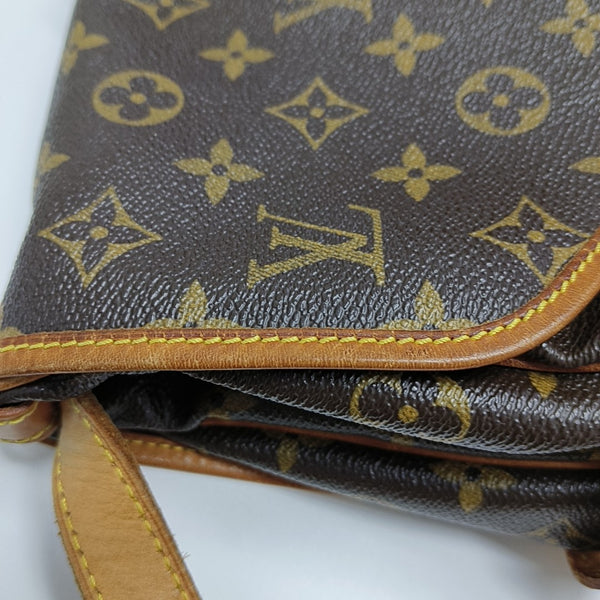 SAUMUR Monogram Coated Canvas Brown