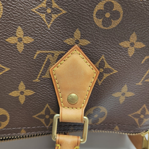 SPEEDY 30 Monogram Coated Canvas Brown