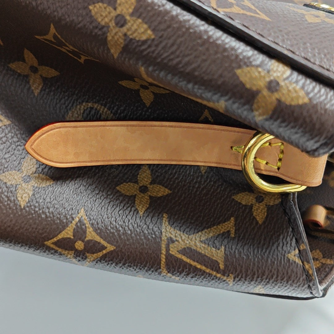 MONTAIGNE Monogram Coated Canvas Brown