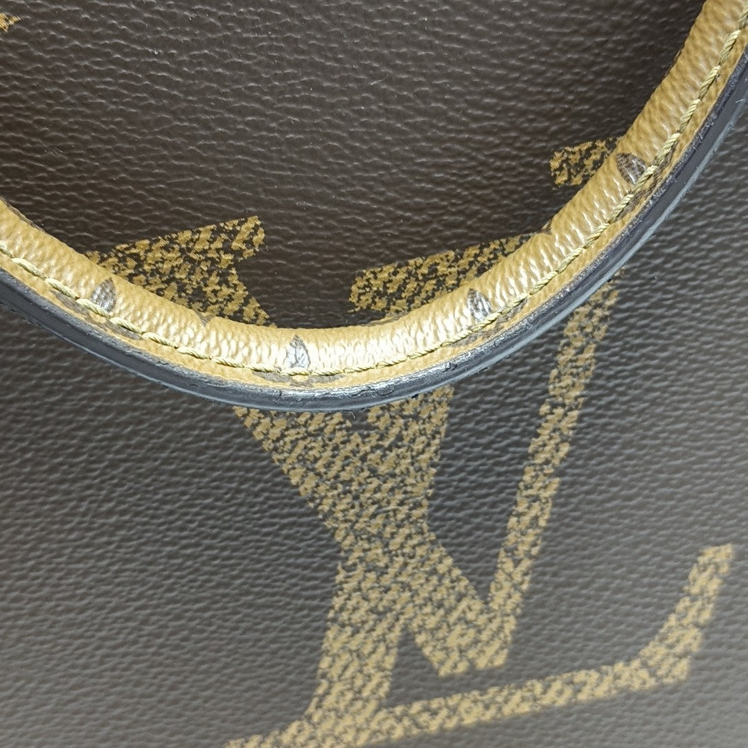 ONTHEGO GM Monogram Coated Canvas Brown