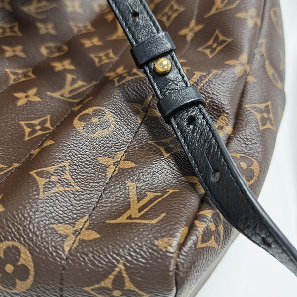 Monogram Coated Canvas Backpack Brown