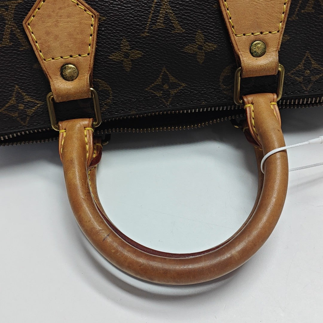 SPEEDY 25 Monogram Coated Canvas Brown