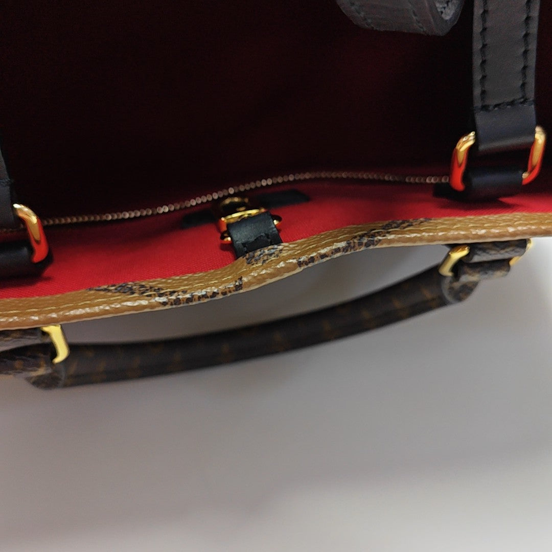 ONTHEGO MM Monogram Coated Canvas Brown