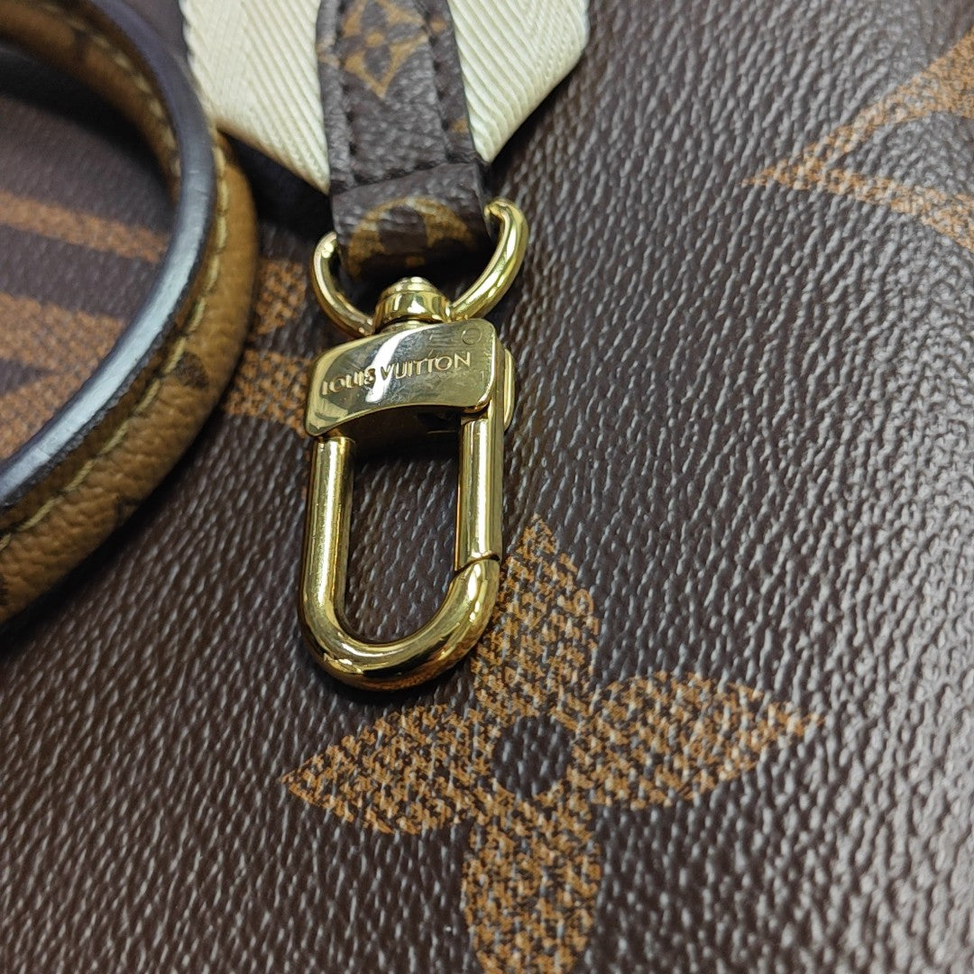 ONTHEGO PM Monogram Coated Canvas Brown