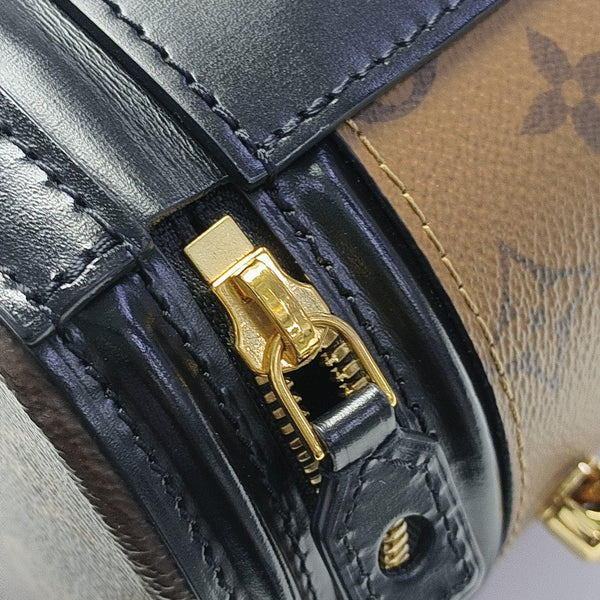 CANNES PM Monogram Coated Canvas Brown