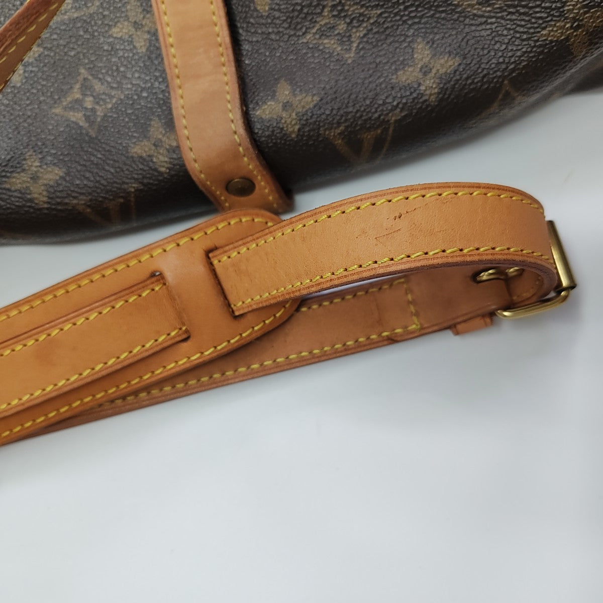 SAUMUR Monogram Coated Canvas Brown
