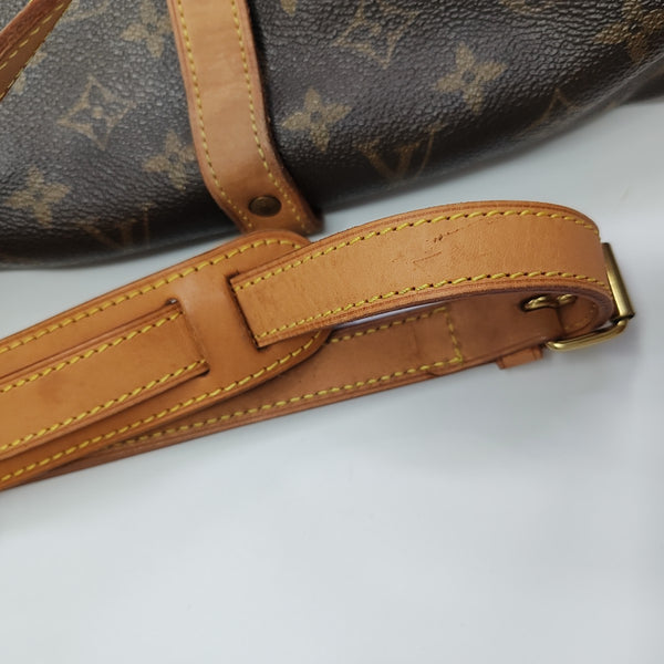 SAUMUR Monogram Coated Canvas Brown