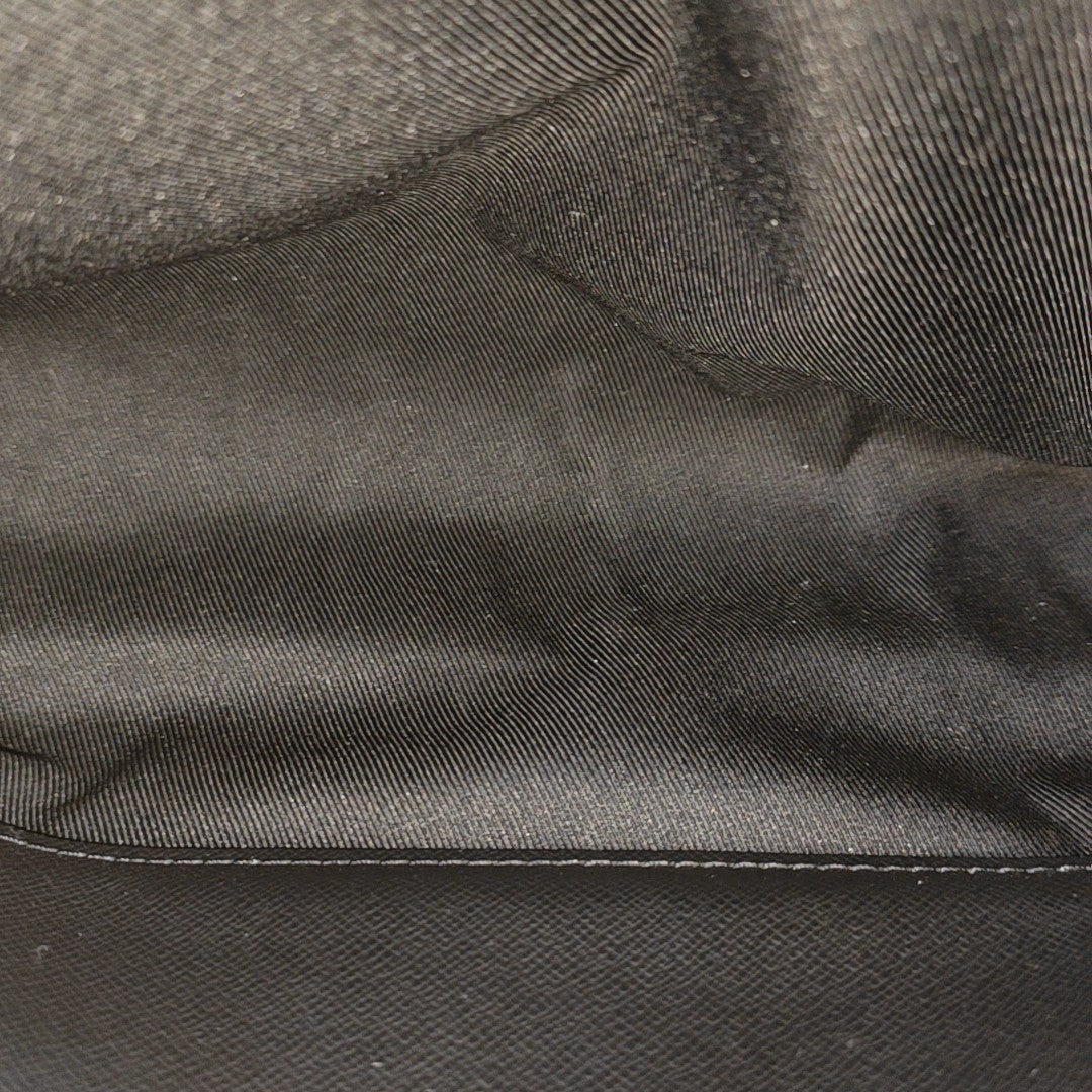 Pochette Voyag MM Monogram Coated Canvas Black