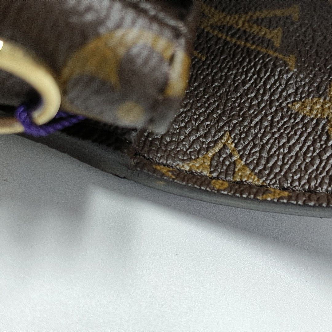 MÉTIS MM Monogram Coated Canvas Brown