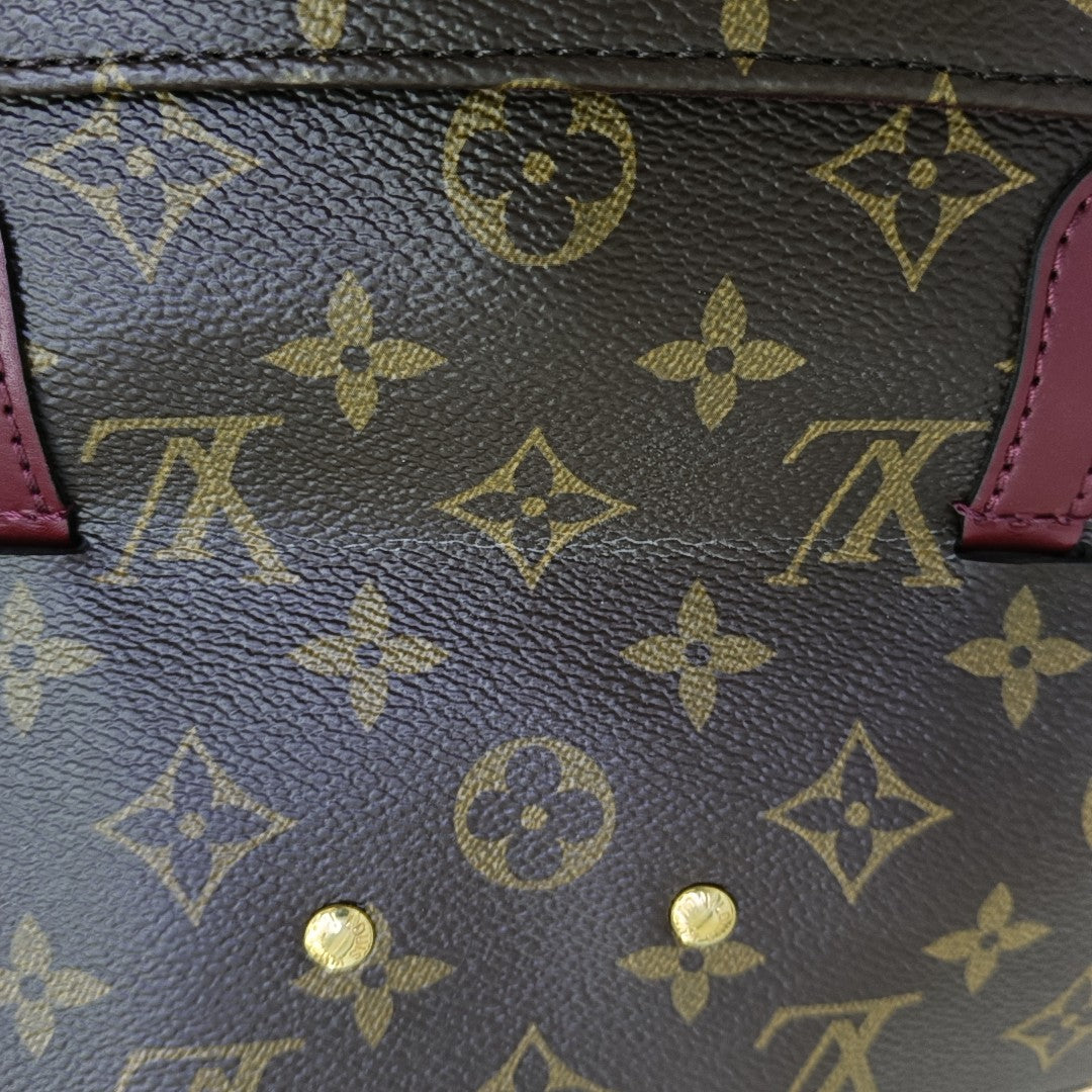 VÉNUS Monogram Coated Canvas Brown