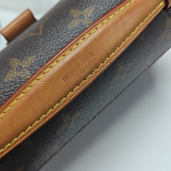 MÉTIS EAST WEST Monogram Coated Canvas Brown