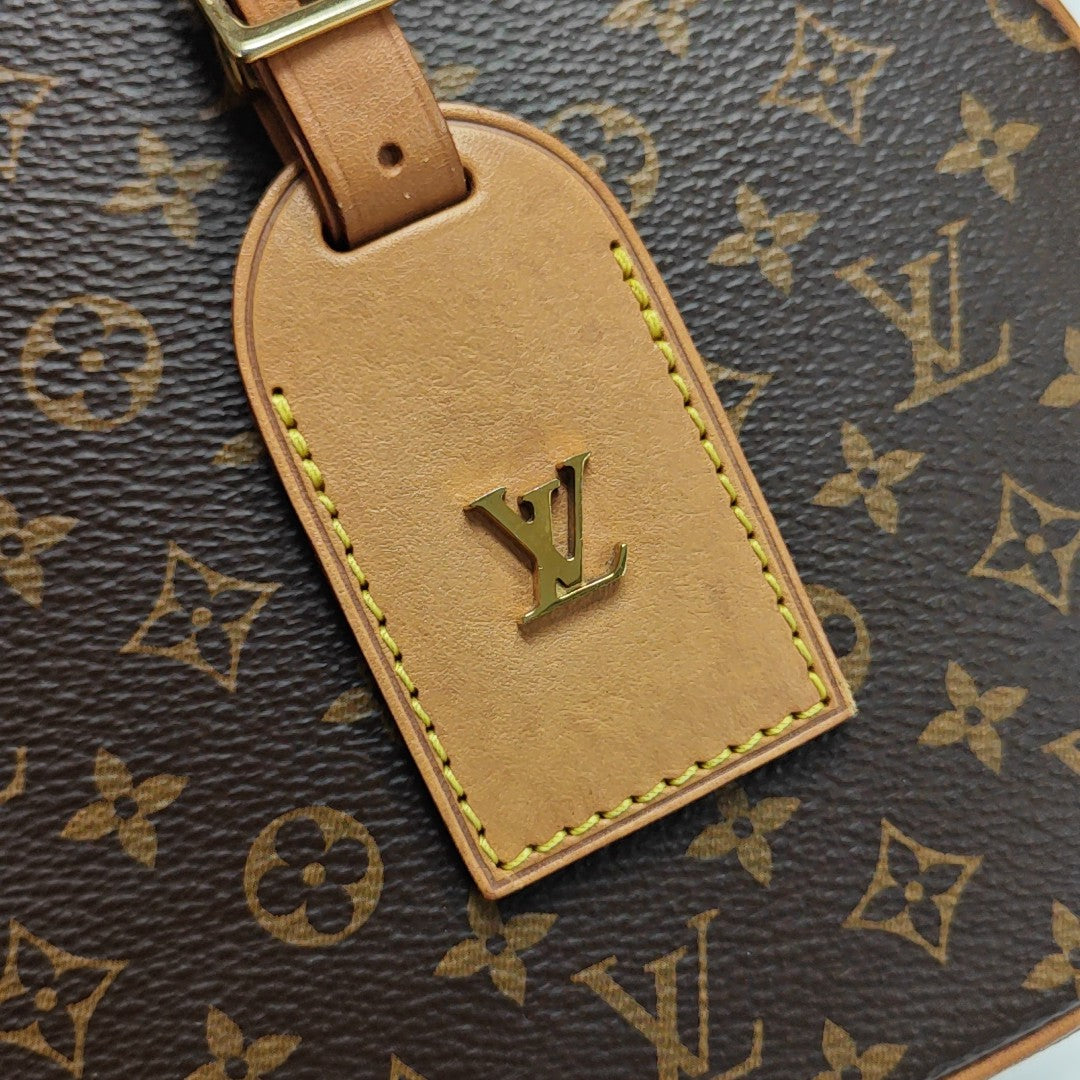 BOITE CHAPEAU PM Monogram Coated Canvas Brown