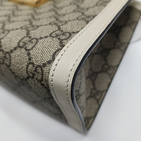Padlock Small Monogram Coated Canvas Beige