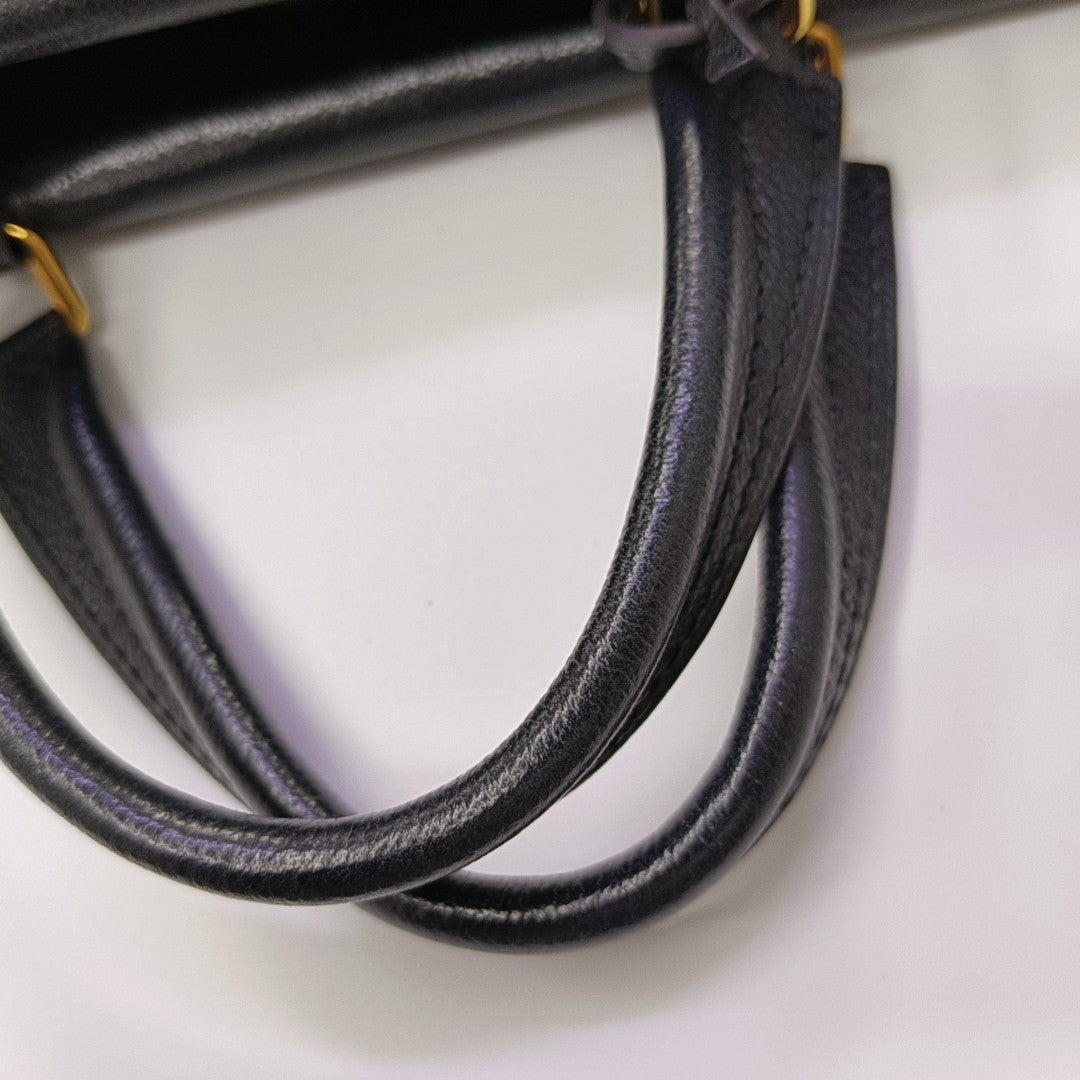 VÉNUS Monogram Coated Canvas Brown