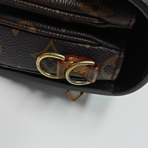 MÉTIS EAST WEST Monogram Coated Canvas Brown