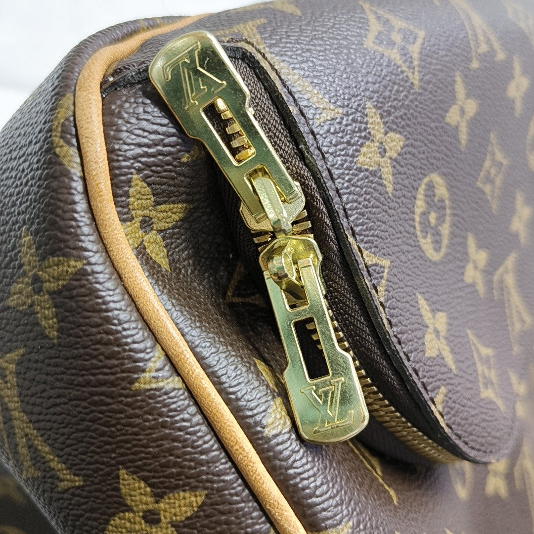 EVASION Monogram Coated Canvas Brown