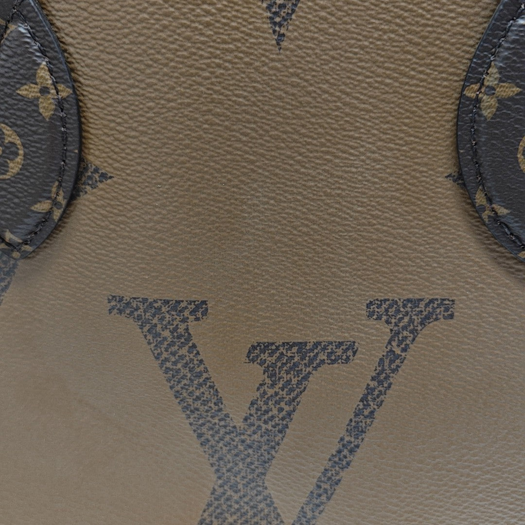 ONTHEGO MM Monogram Coated Canvas Brown