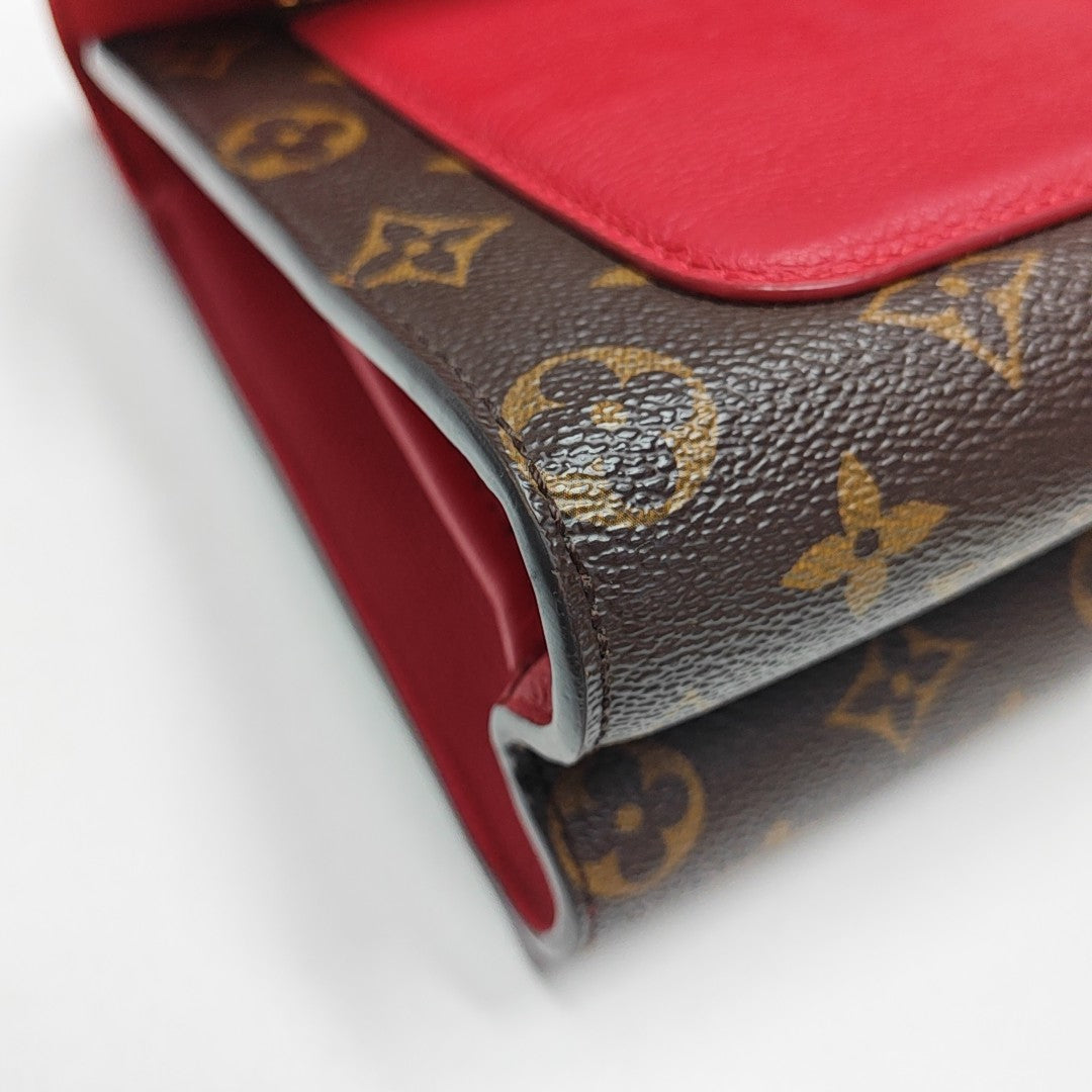 VICTOIRE Monogram Coated Canvas Brown