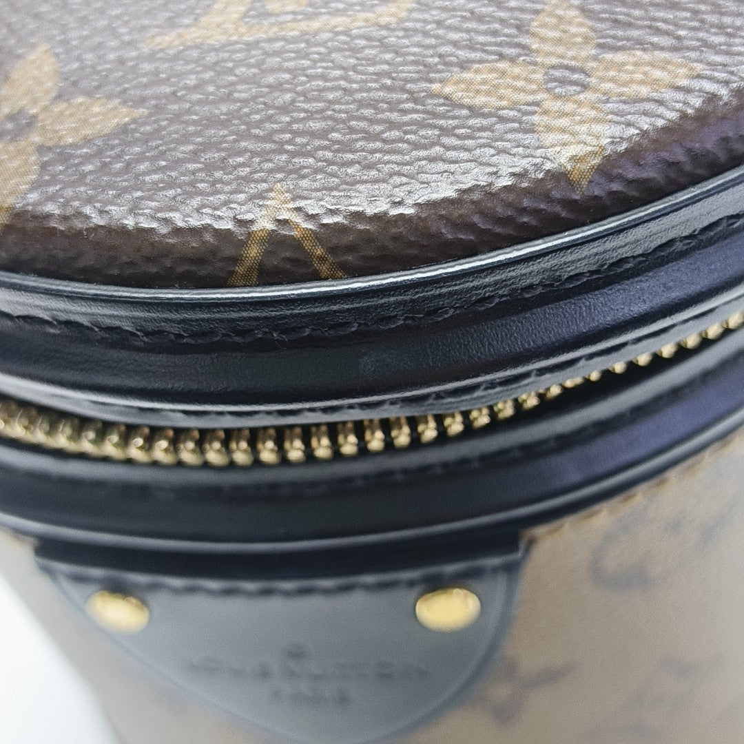 CANNES PM Monogram Coated Canvas Brown