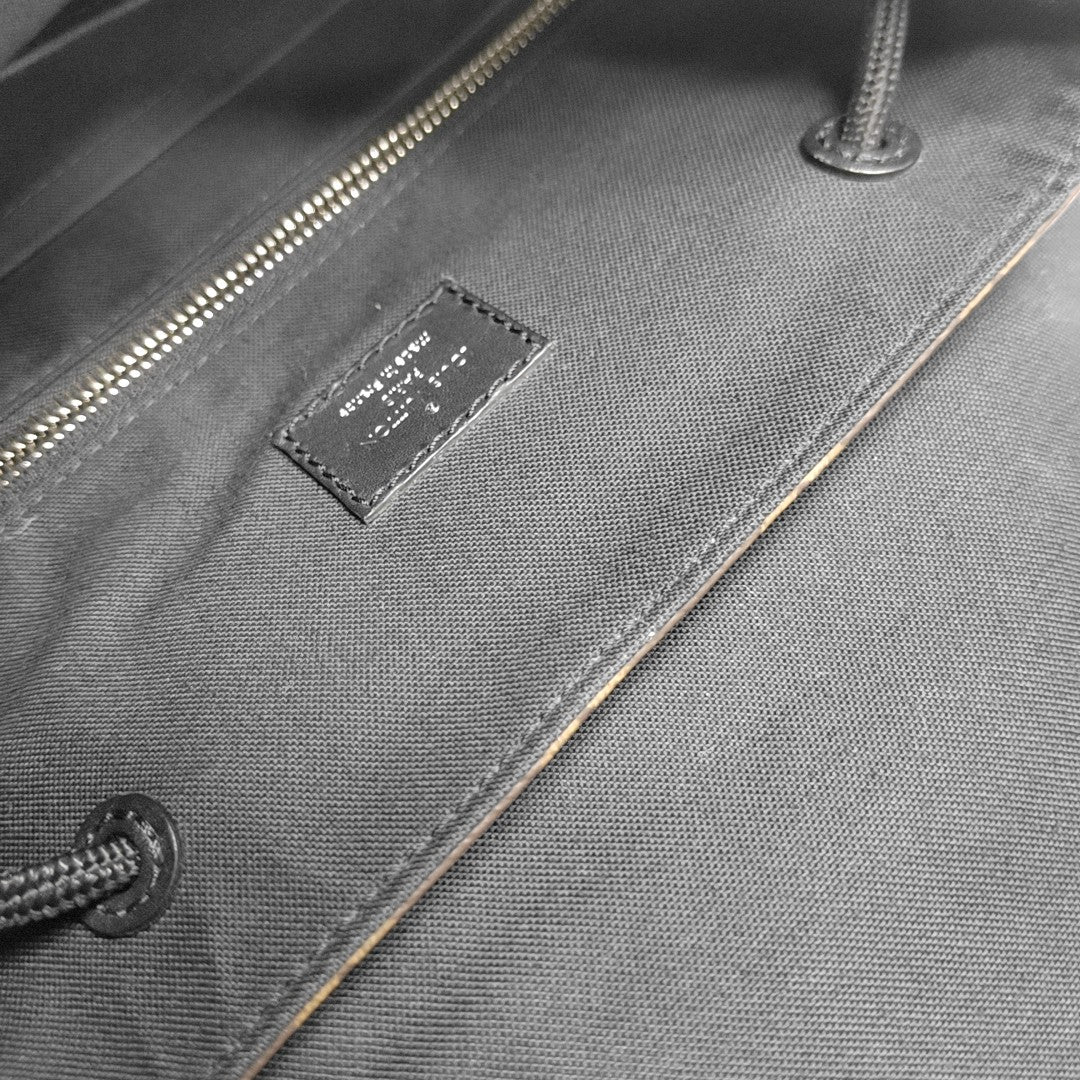 CHRISTOPHER PM Monogram Coated Canvas Brown