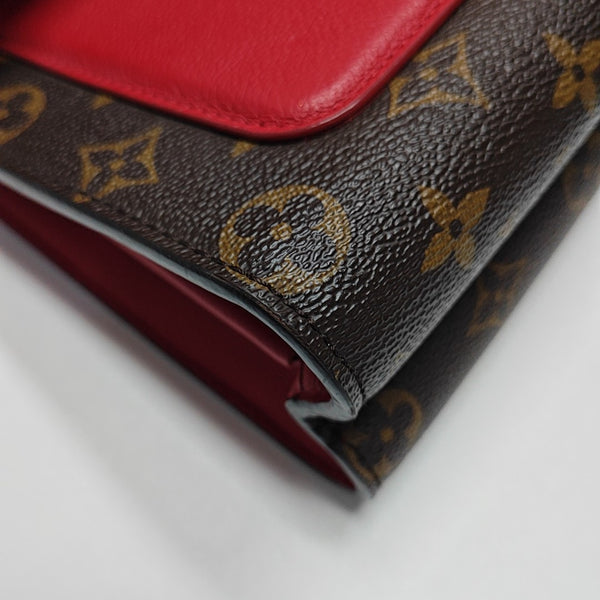 VICTOIRE Monogram Coated Canvas Brown