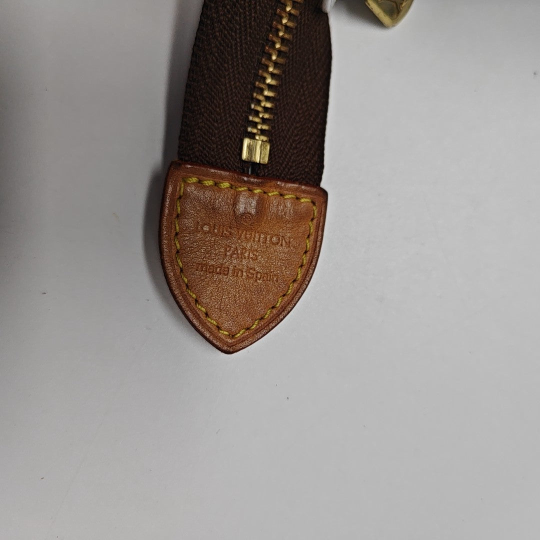 TOILET POCKET 19 Monogram Coated Canvas Brown