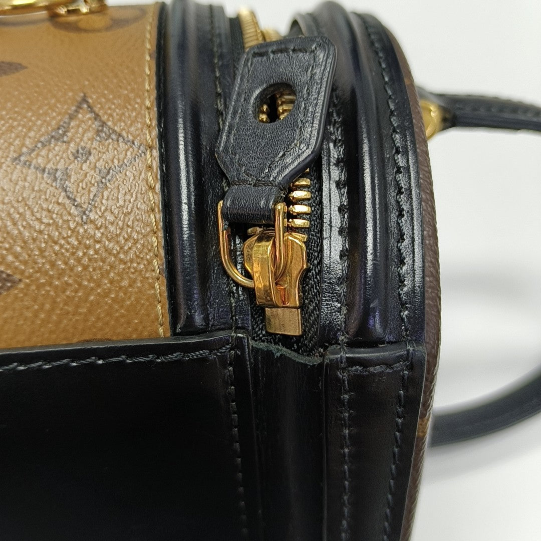 CANNES PM Monogram Coated Canvas Brown