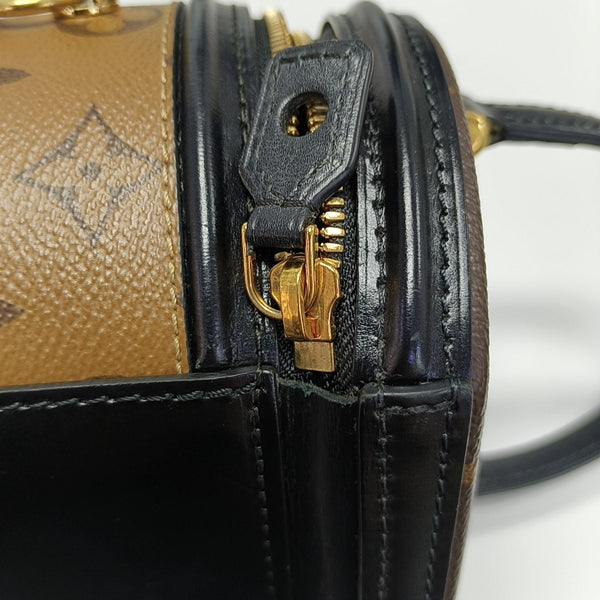 CANNES PM Monogram Coated Canvas Brown