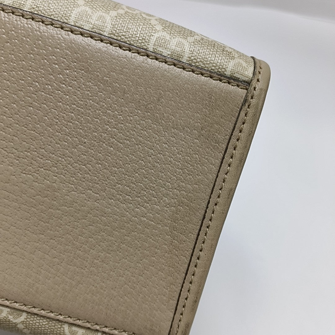 Retro Small Monogram Coated Canvas Beige