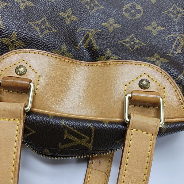 EXCURSION Monogram Coated Canvas Brown