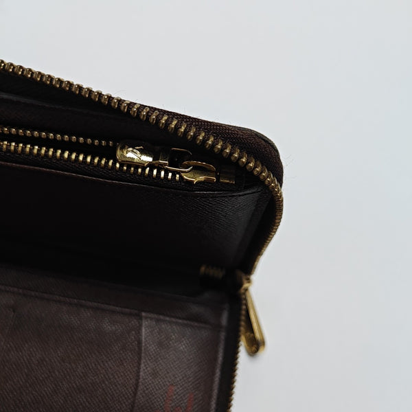 ZIPPY Damier Ebene Coated Canvas Brown Wallet