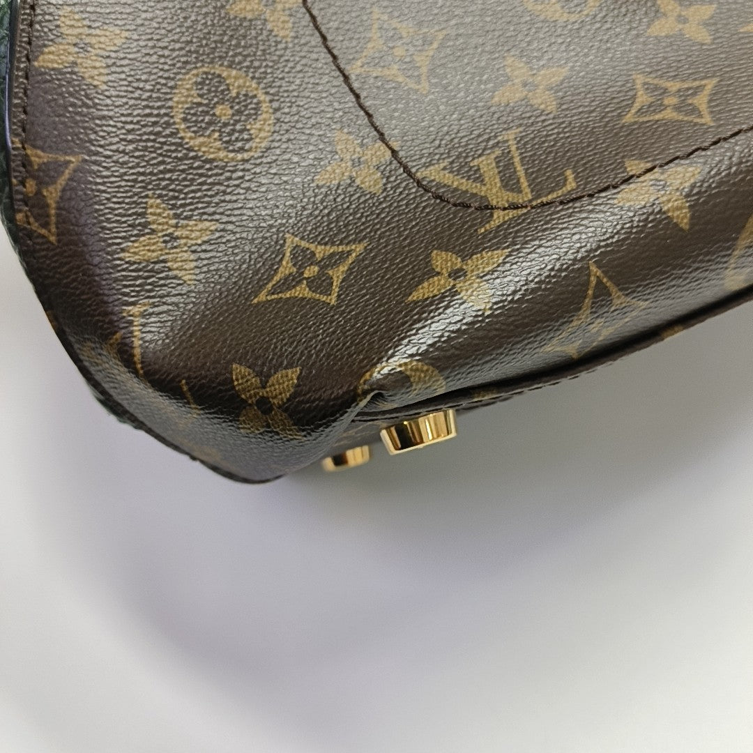 MAJESTUEUX Monogram Coated Canvas Brown
