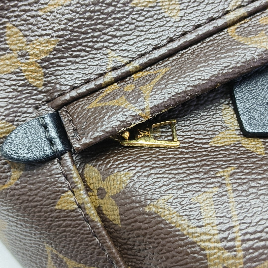 PALM SPRINGS Mini Monogram Coated Canvas Brown